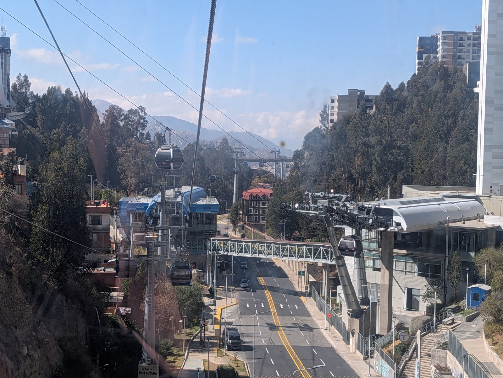 Mi Teleférico. Eight to a cabin, hello on the way in, goodbye on the way out.