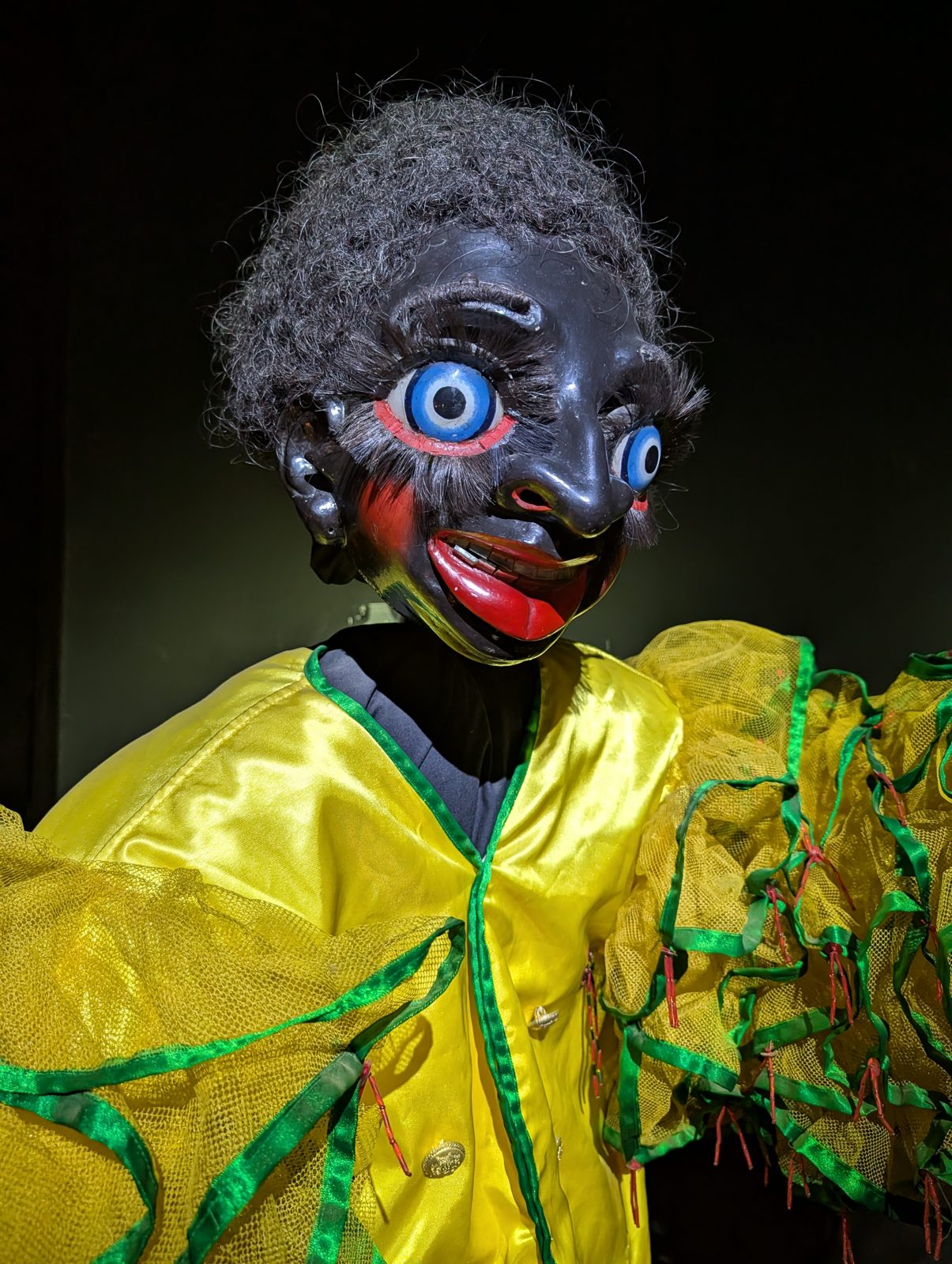 Black mask, yellow satin.