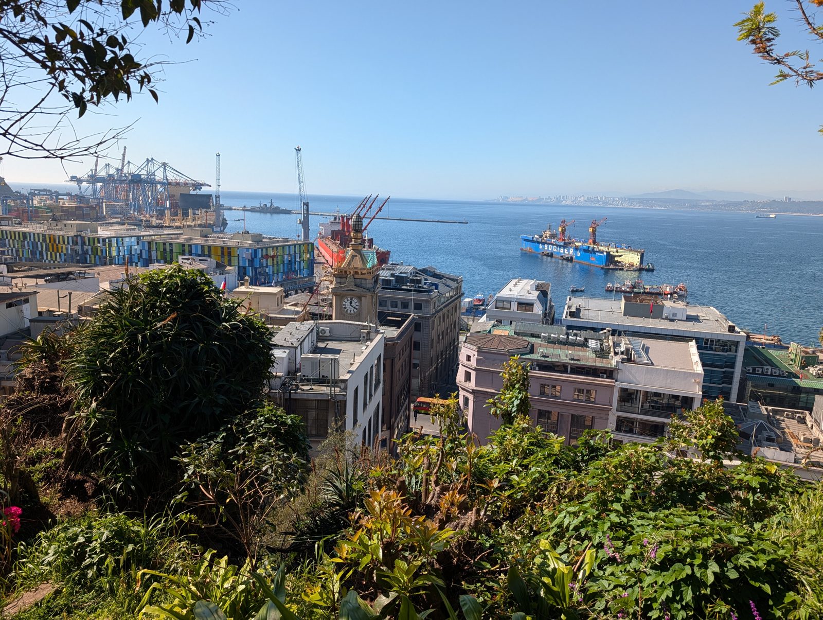 The port, the cranes, and the Pacific.
