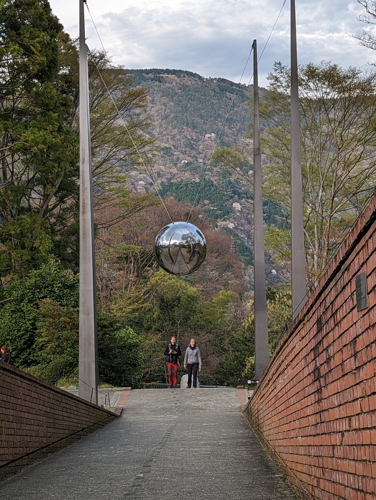 The sphere, suspended between the posts.