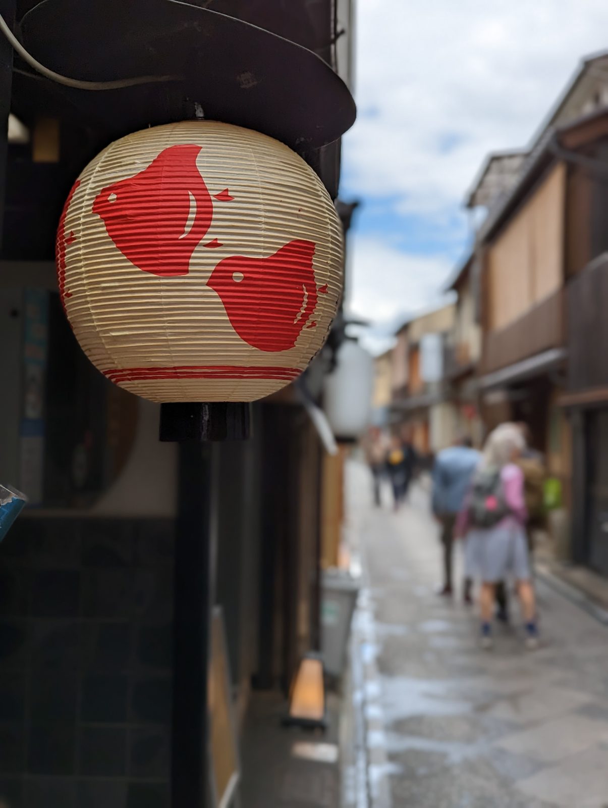 Gion. A lantern with two fish.