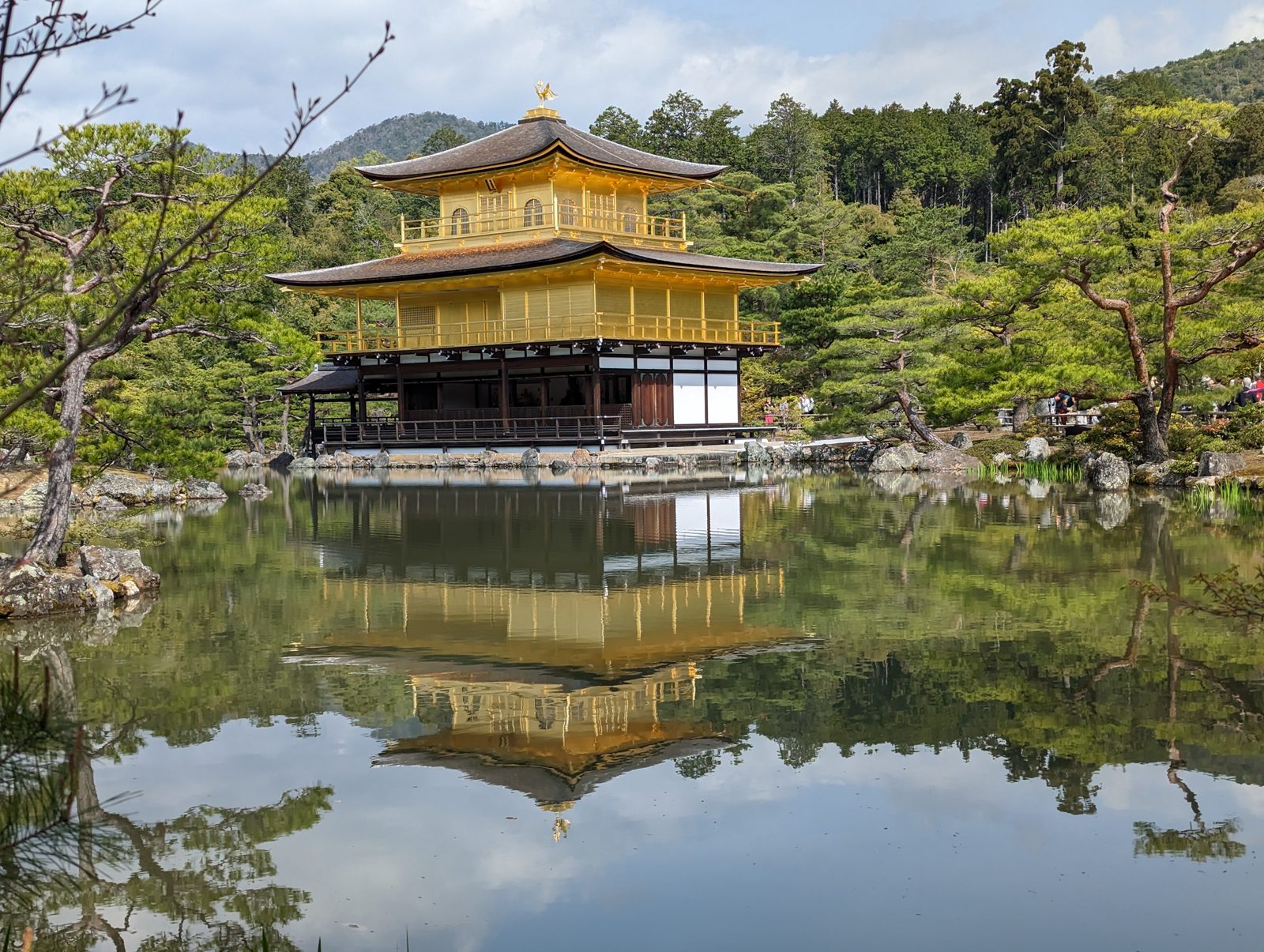 Kinkaku-ji. Gold leaf, and its reflection.
