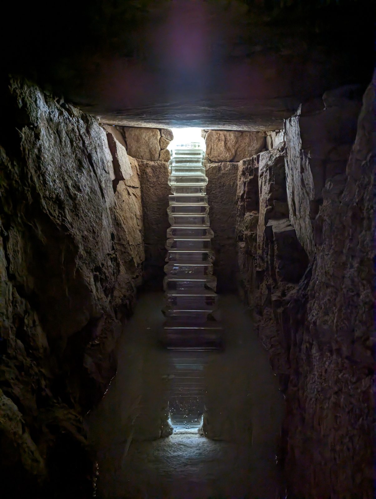 The stairs, from the chamber below.